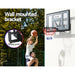 Boy on a man shoulder taking shot on Everfit 45 Inch basketball ring mounting on a white wall outside