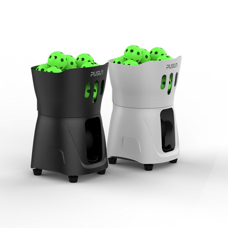 black and white Pusun PP Mini pickleball machine left angle views with green pickleballs on top